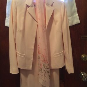 Suit wore once and was dry cleaned